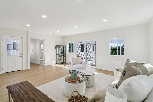 1740 Petra Dr, San Diego, CA 92104 - living room featuring light wood-type flooring, recessed lighting, and baseboards