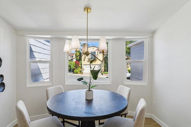 1740 Petra Dr, San Diego, CA 92104 - dining room with baseboards and wood finished floors