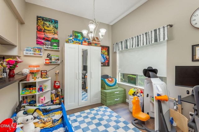 1772 Sinaloa Rd Unit 290, Simi Valley, CA 93065 - recreation room with wood finished floors, a chandelier, and vaulted ceiling