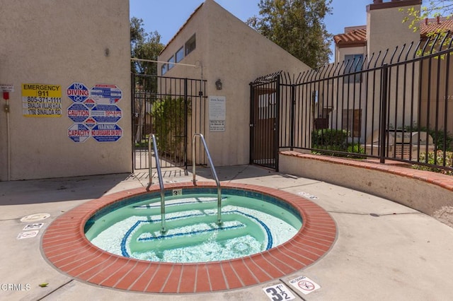 1772 Sinaloa Rd Unit 290, Simi Valley, CA 93065 - view of pool featuring a gate and a community hot tub
