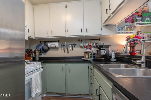 1772 Sinaloa Rd Unit 290, Simi Valley, CA 93065 - kitchen with stainless steel appliances, a sink, white cabinetry, and dark countertops