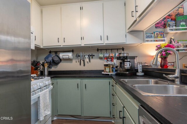 1772 Sinaloa Rd Unit 290, Simi Valley, CA 93065 - kitchen featuring white appliances, white cabinets, and dark countertops