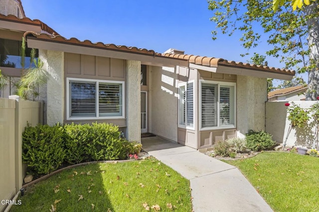 2036 Birchdale Ct, Thousand Oaks, CA 91362 - doorway to property with a tiled roof and stucco siding