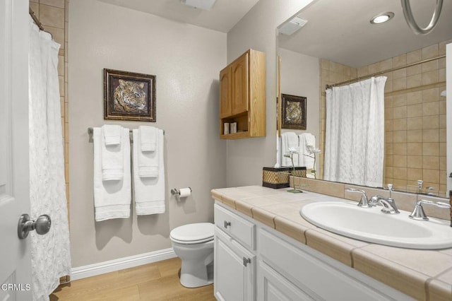 2036 Birchdale Ct, Thousand Oaks, CA 91362 - full bath with toilet, vanity, wood finished floors, curtained shower, and baseboards