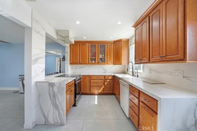 15330 Hart St, Van Nuys, CA 91406 - kitchen with stainless steel range with electric cooktop, a sink, dishwasher, glass insert cabinets, and brown cabinetry
