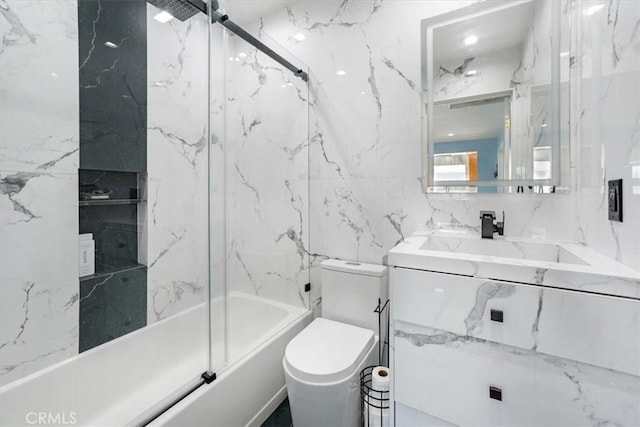 15330 Hart St, Van Nuys, CA 91406 - bathroom featuring bath / shower combo with glass door, toilet, vanity, and tile walls