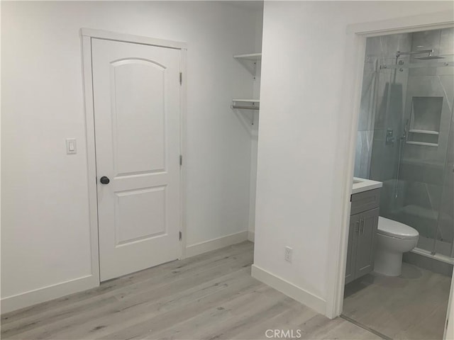 15330 Hart St, Van Nuys, CA 91406 - walk in closet with light wood-style floors