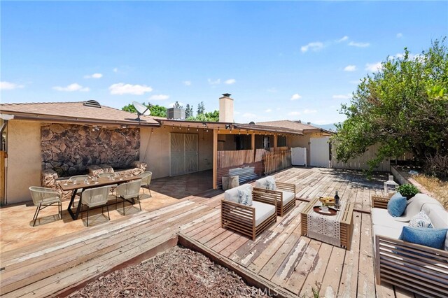 42153 Carnegie Ave, Hemet, CA 92544 - wooden terrace with an outdoor living space and outdoor dining area