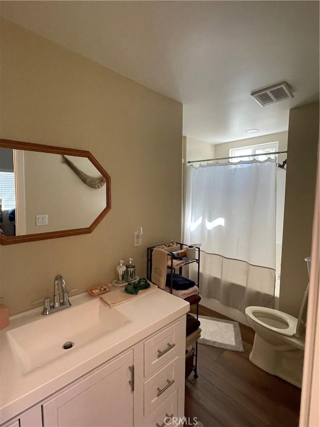 4313 Longview Ln, Paso Robles, CA 93446 - bathroom featuring vanity, toilet, and wood finished floors
