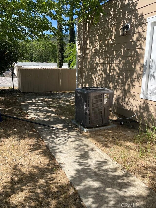 4313 Longview Ln, Paso Robles, CA 93446 - exterior view of central AC and a wood stove