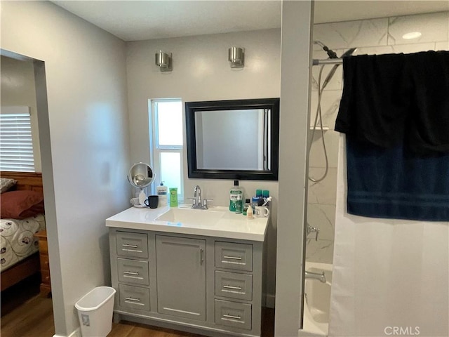 4313 Longview Ln, Paso Robles, CA 93446 - full bathroom with ensuite bathroom, vanity, washtub / shower combination, and wood finished floors