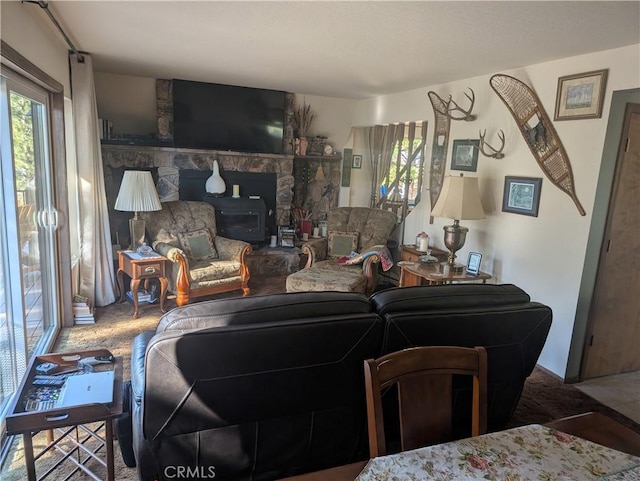 31 Matterhorn Dr, Bridgeport, CA 93517 - carpeted living room featuring plenty of natural light and a stone fireplace
