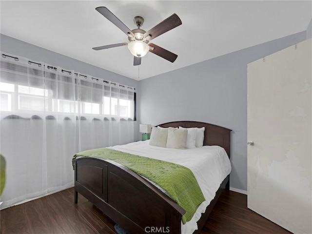 933 E 1st St Unit 7, Long Beach, CA 90802 - bedroom with wood finished floors, a ceiling fan, and baseboards