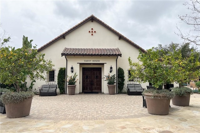16 Fenix St, Rancho Mission Viejo, CA 92694 - mediterranean / spanish home with a tiled roof, stucco siding, and a patio area