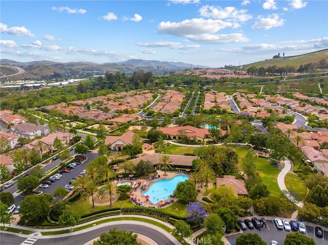 16 Fenix St, Rancho Mission Viejo, CA 92694 - view of property location featuring a mountain backdrop, nearby suburban area, and a pool