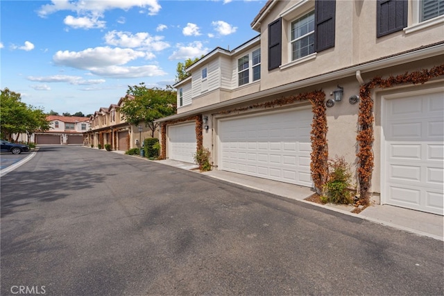 16 Fenix St, Rancho Mission Viejo, CA 92694 - view of asphalt street with a residential view