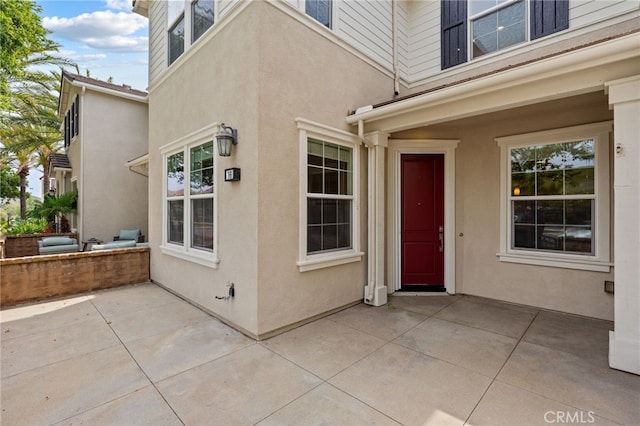 16 Fenix St, Rancho Mission Viejo, CA 92694 - property entrance featuring stucco siding and a patio