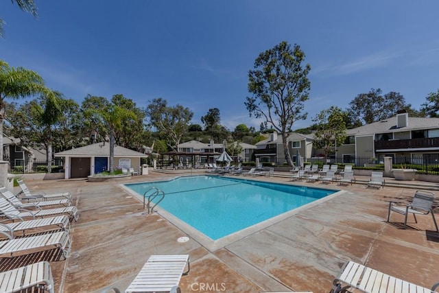 19134 Alamo Ln Unit 162, Yorba Linda, CA 92886 - community pool featuring a patio area and a residential view