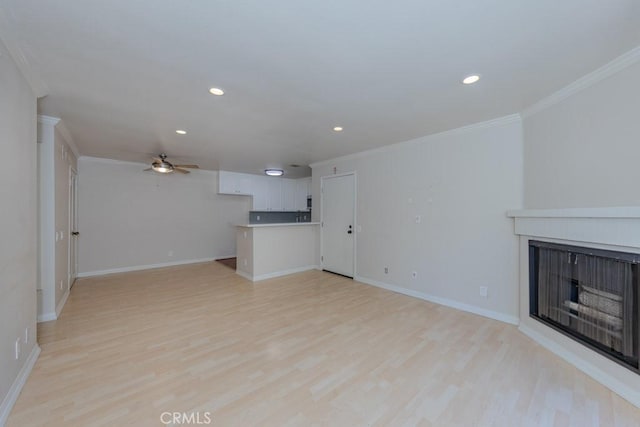 19134 Alamo Ln Unit 162, Yorba Linda, CA 92886 - unfurnished living room featuring crown molding, ceiling fan, light wood finished floors, a fireplace, and recessed lighting