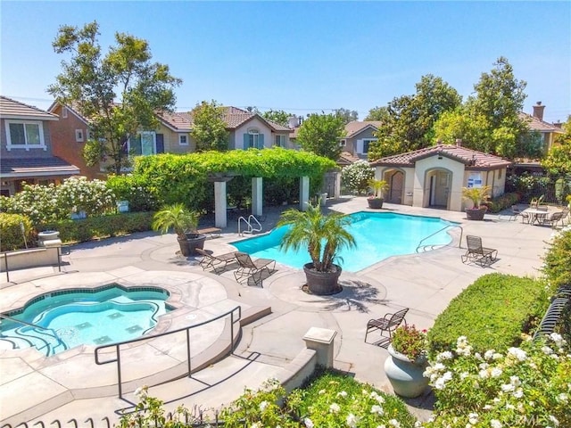 3738 Springmount St, Riverside, CA 92501 - community pool with a community hot tub, a patio, and a residential view