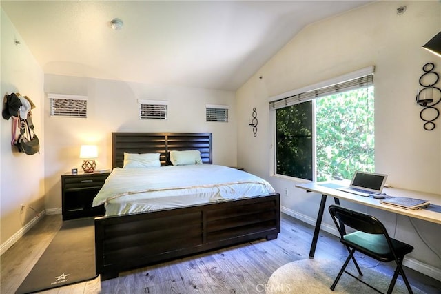 3738 Springmount St, Riverside, CA 92501 - bedroom featuring lofted ceiling, baseboards, wood finished floors, and a desk