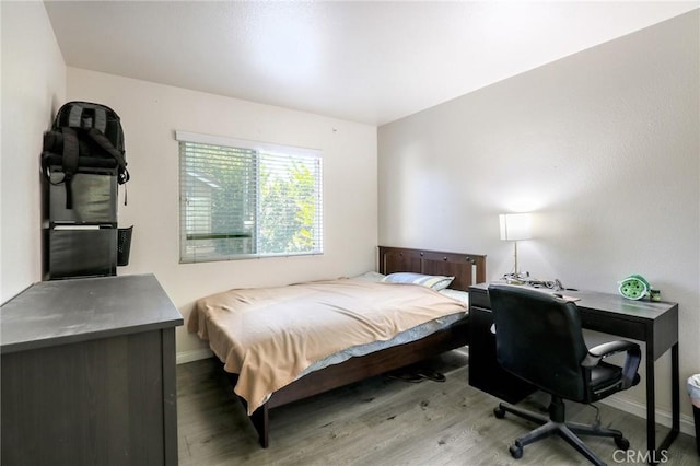 3738 Springmount St, Riverside, CA 92501 - bedroom with wood finished floors and baseboards