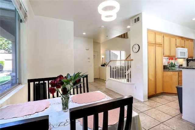 3738 Springmount St, Riverside, CA 92501 - dining area with light tile patterned floors, recessed lighting, and a chandelier