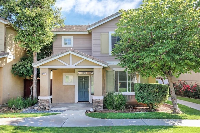 3738 Springmount St, Riverside, CA 92501 - view of front of home with covered porch and stucco siding