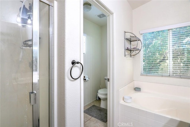3738 Springmount St, Riverside, CA 92501 - full bath with a stall shower, toilet, a bath, and tile patterned flooring