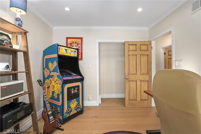 22941 Keswick St, West Hills, CA 91304 - home office with wood finished floors, crown molding, baseboards, and recessed lighting