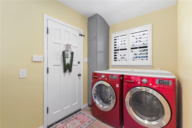 22941 Keswick St, West Hills, CA 91304 - washroom with washing machine and clothes dryer and baseboards