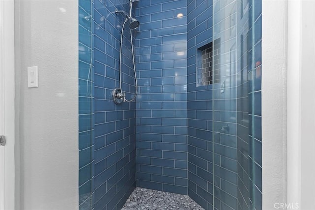 22941 Keswick St, West Hills, CA 91304 - bathroom with tiled shower and a textured wall