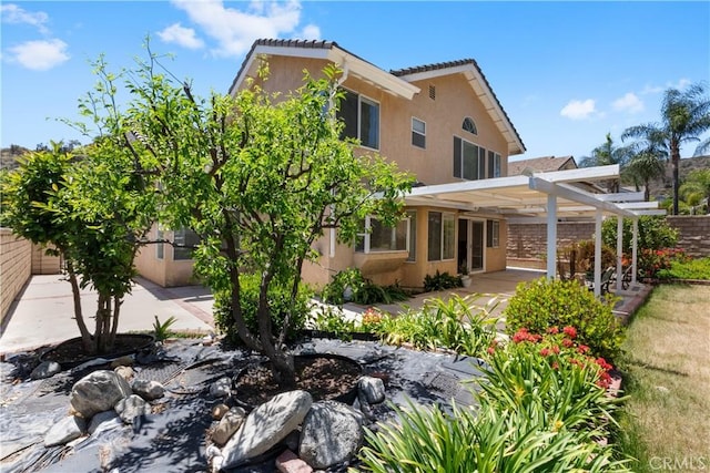 21965 Jeffers Ln, Saugus, CA 91350 - back of property with a patio, a pergola, and stucco siding