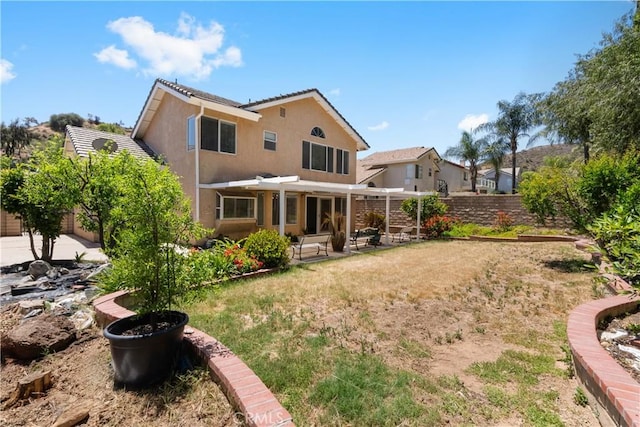 21965 Jeffers Ln, Saugus, CA 91350 - rear view of property with a pergola, a patio, stucco siding, and a fenced backyard