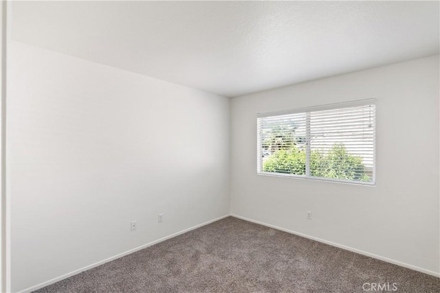 21965 Jeffers Ln, Saugus, CA 91350 - carpeted spare room with baseboards