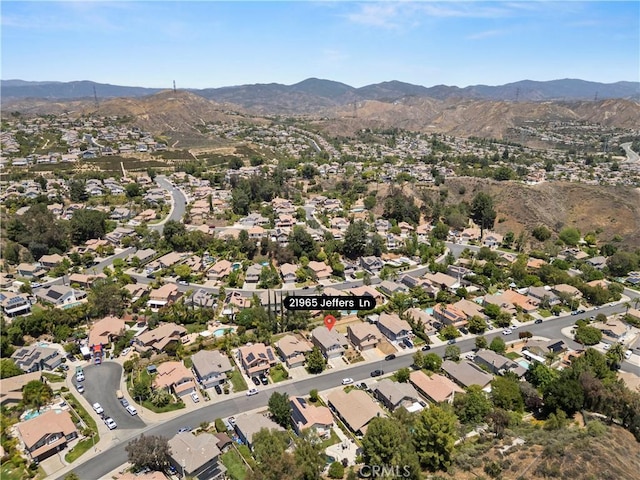 21965 Jeffers Ln, Saugus, CA 91350 - aerial view of property and surrounding area with a mountainous background and nearby suburban area