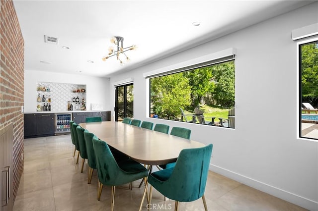 2305 Henrietta Ave, La Crescenta, CA 91214 - dining room with beverage cooler, a dry bar, plenty of natural light, light tile patterned floors, and recessed lighting