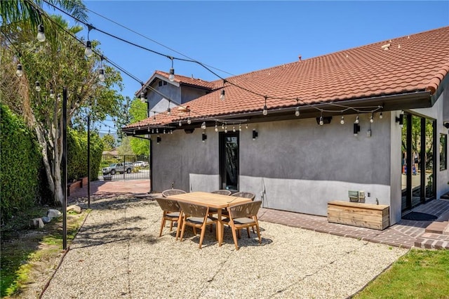 2305 Henrietta Ave, La Crescenta, CA 91214 - back of property with a tiled roof, a patio, stucco siding, and outdoor dining area