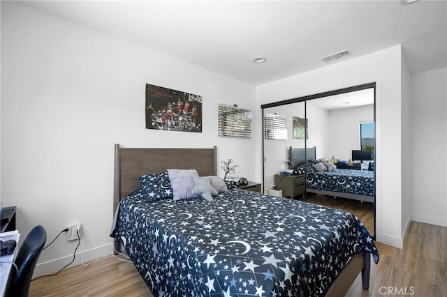 2305 Henrietta Ave, La Crescenta, CA 91214 - bedroom with wood finished floors, baseboards, and a closet
