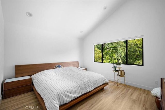 2305 Henrietta Ave, La Crescenta, CA 91214 - bedroom featuring light wood finished floors, high vaulted ceiling, and baseboards