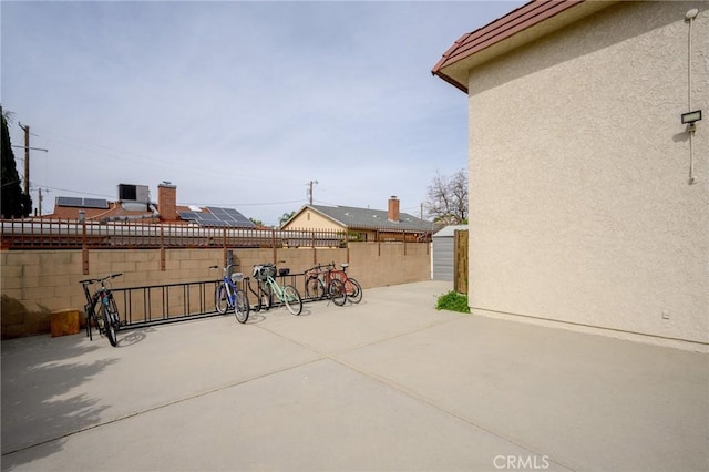 11025 Kittridge St Unit 128, North Hollywood, CA 91606 - fenced backyard featuring a patio and central AC unit