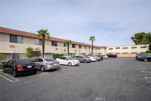 11025 Kittridge St Unit 128, North Hollywood, CA 91606 - uncovered parking lot with a residential view