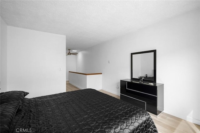 11025 Kittridge St Unit 128, North Hollywood, CA 91606 - bedroom with light wood-style flooring and a textured ceiling