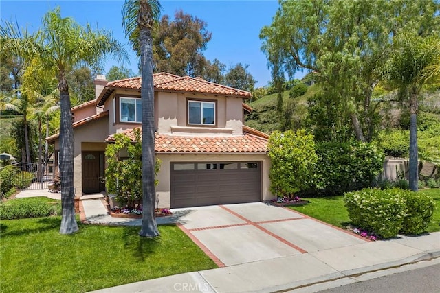 21 Mykonos, Laguna Niguel, CA 92677 - mediterranean / spanish-style house with a tiled roof, stucco siding, a garage, and concrete driveway
