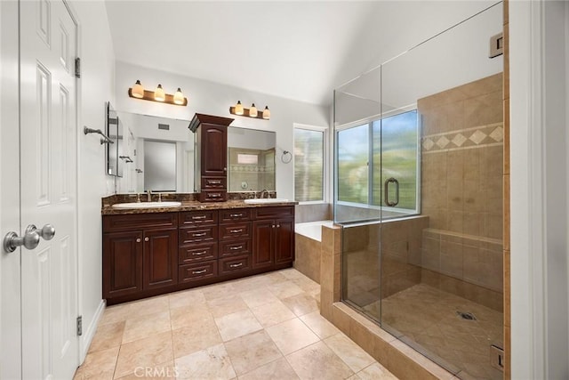 21 Mykonos, Laguna Niguel, CA 92677 - bathroom with double vanity, a stall shower, tile patterned floors, and vaulted ceiling