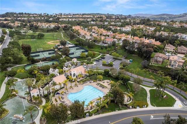 21 Mykonos, Laguna Niguel, CA 92677 - aerial overview of property's location featuring nearby suburban area, a pool area, and a mountainous background
