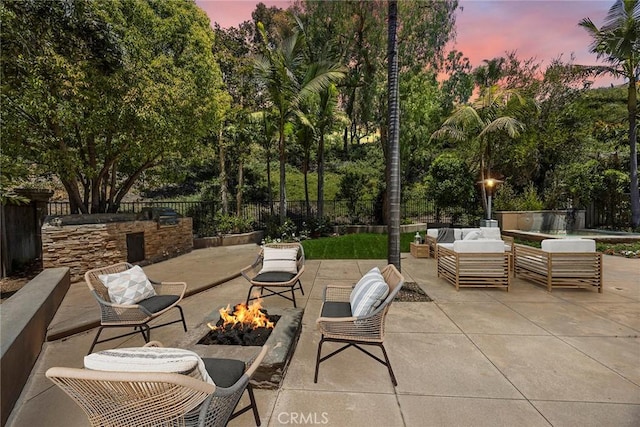 21 Mykonos, Laguna Niguel, CA 92677 - patio terrace at dusk with an outdoor living space with a fire pit and a patio