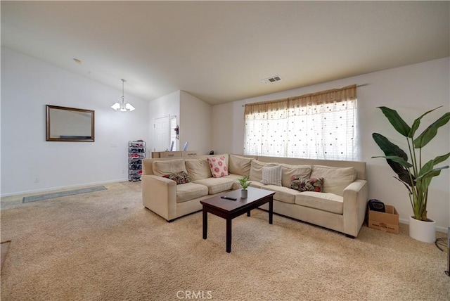 9024 Cascada Rd, Atascadero, CA 93422 - carpeted living room featuring vaulted ceiling, baseboards, and a chandelier