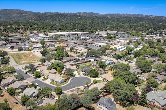 9024 Cascada Rd, Atascadero, CA 93422 - aerial perspective of suburban area featuring a mountainous background