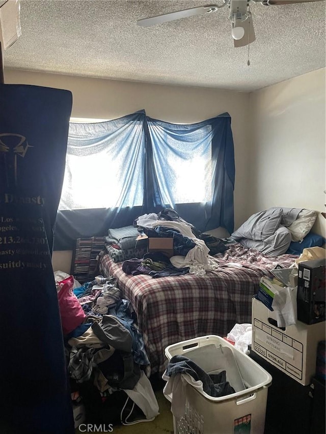 1017 Avenida De Pio Pico, Placentia, CA 92870 - bedroom featuring a textured ceiling, a ceiling fan, and multiple windows